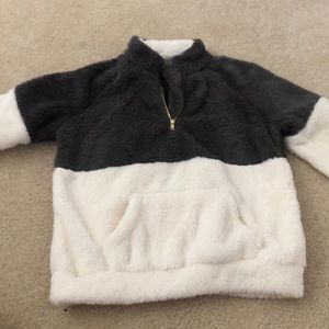 grey and white fuzzy sweatshirt